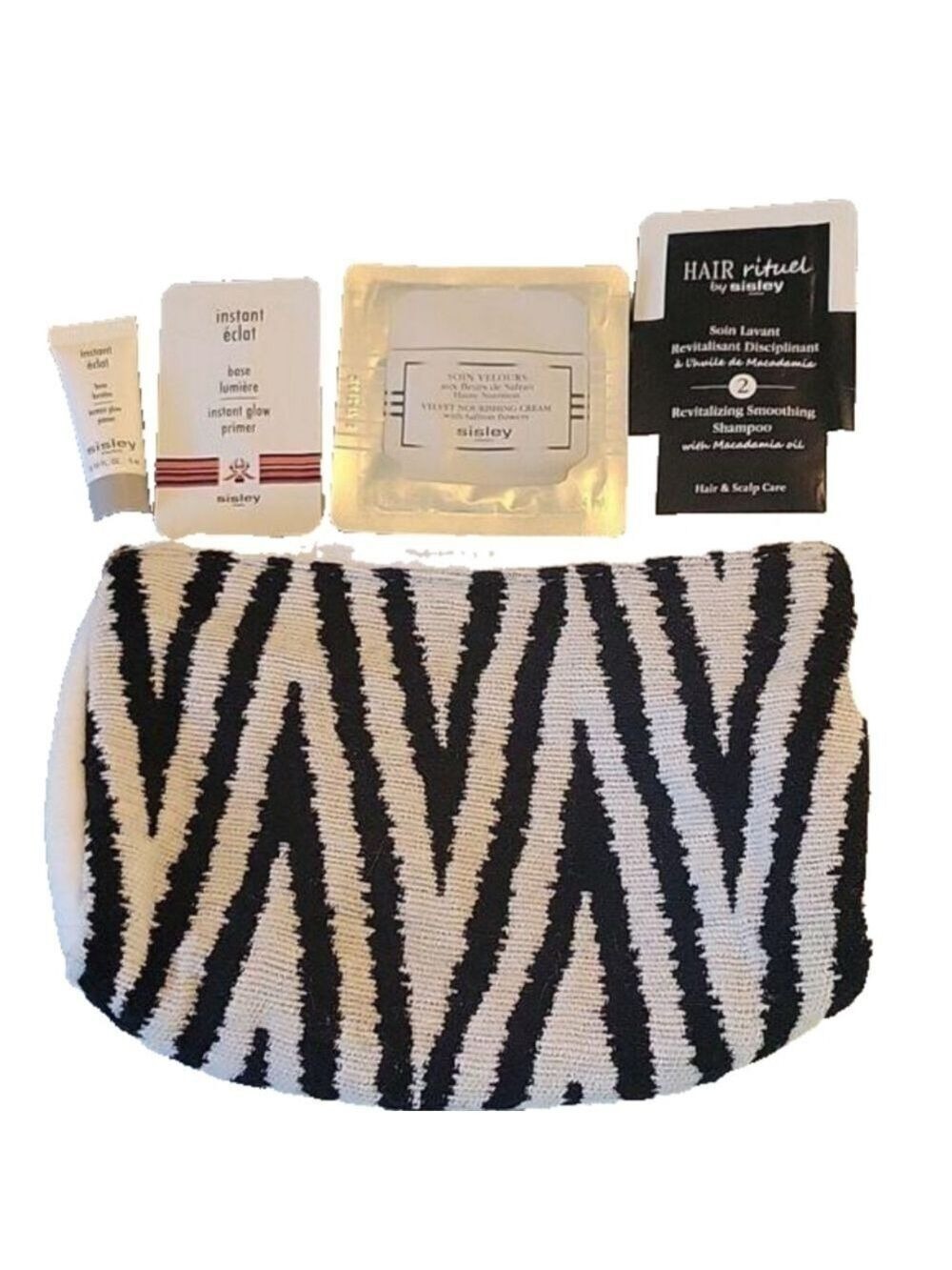 Sisley small makeup bag NWT and 4 Sisley samples